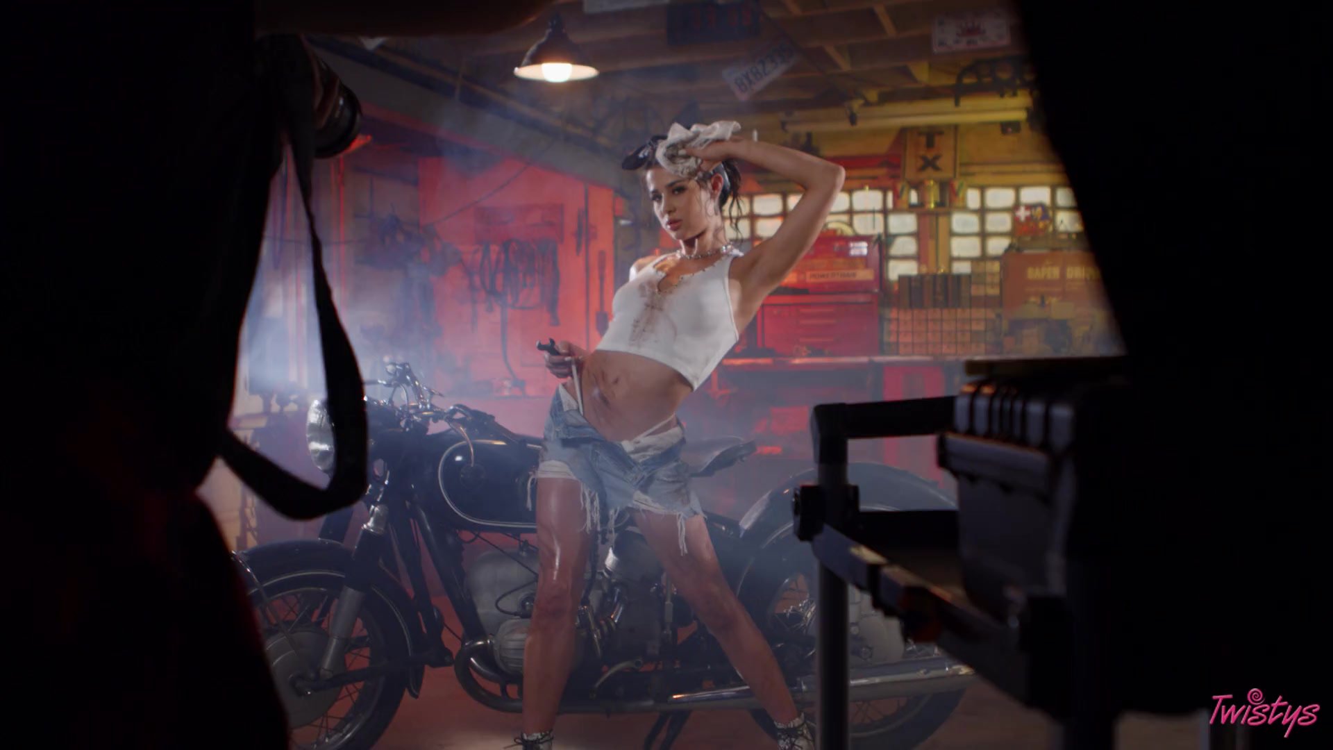 Kylie Rocket is pleasuring herself on top of a black car