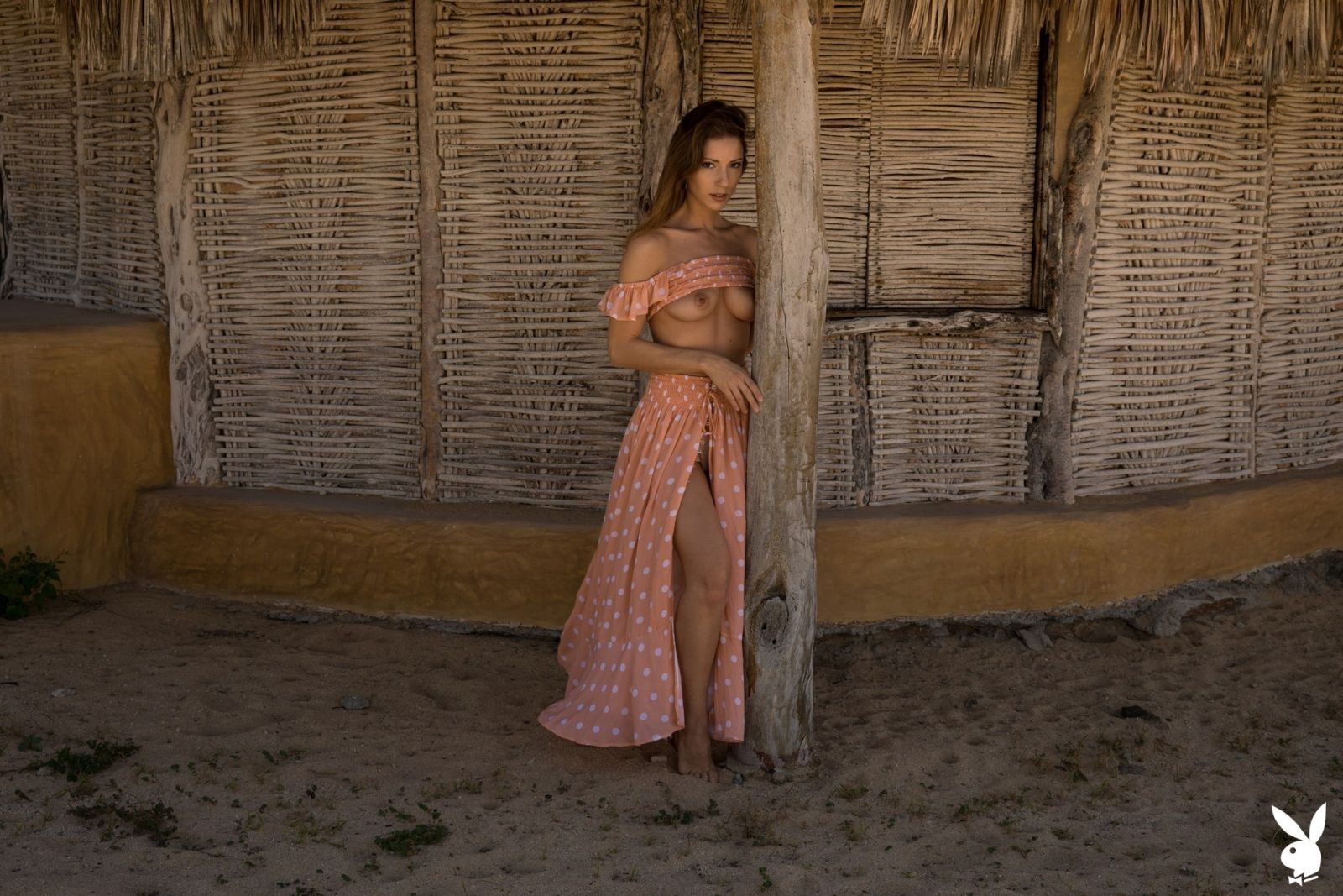 Miluniel Louis takes of her pink dress revealing her natural body