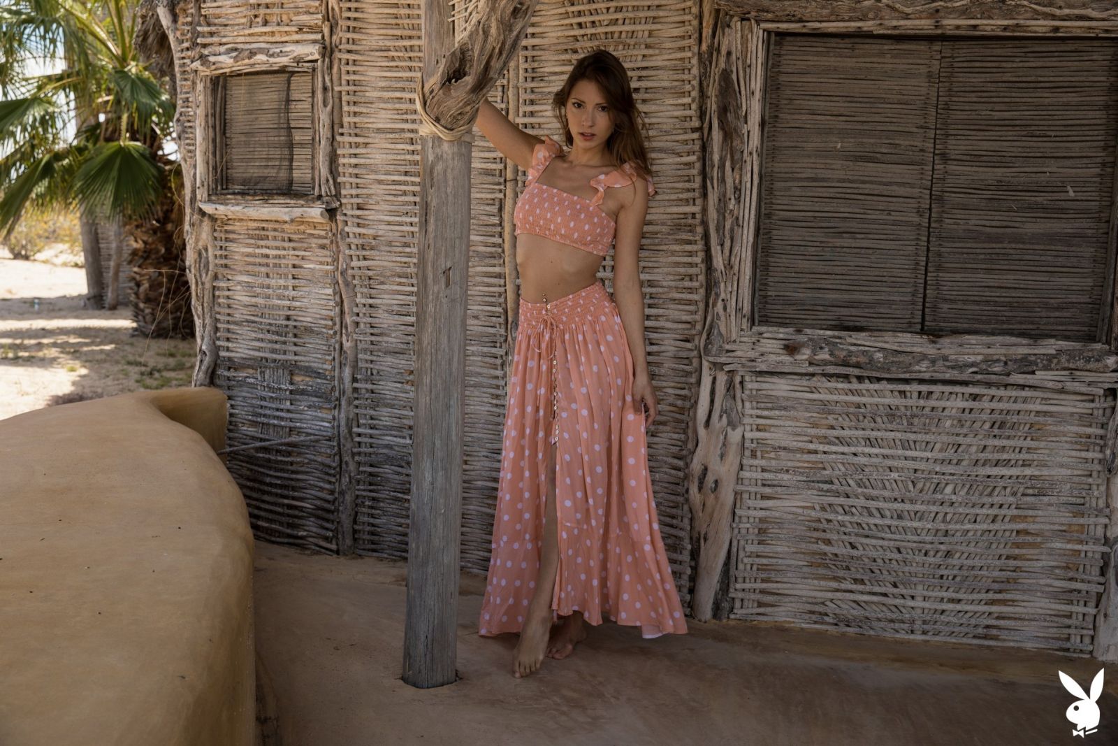 Miluniel Louis takes of her pink dress revealing her natural body