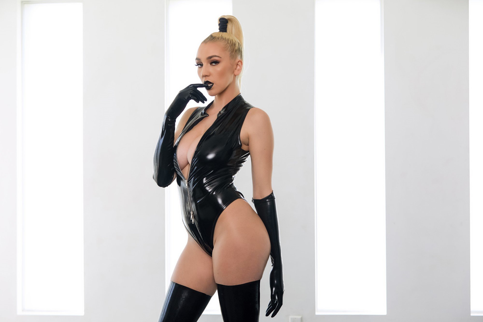 Kendra Sunderland ripping off her black latex bodysuit