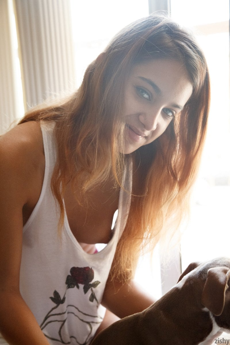 Sexy braless teen Uma Jolie playing with her dog