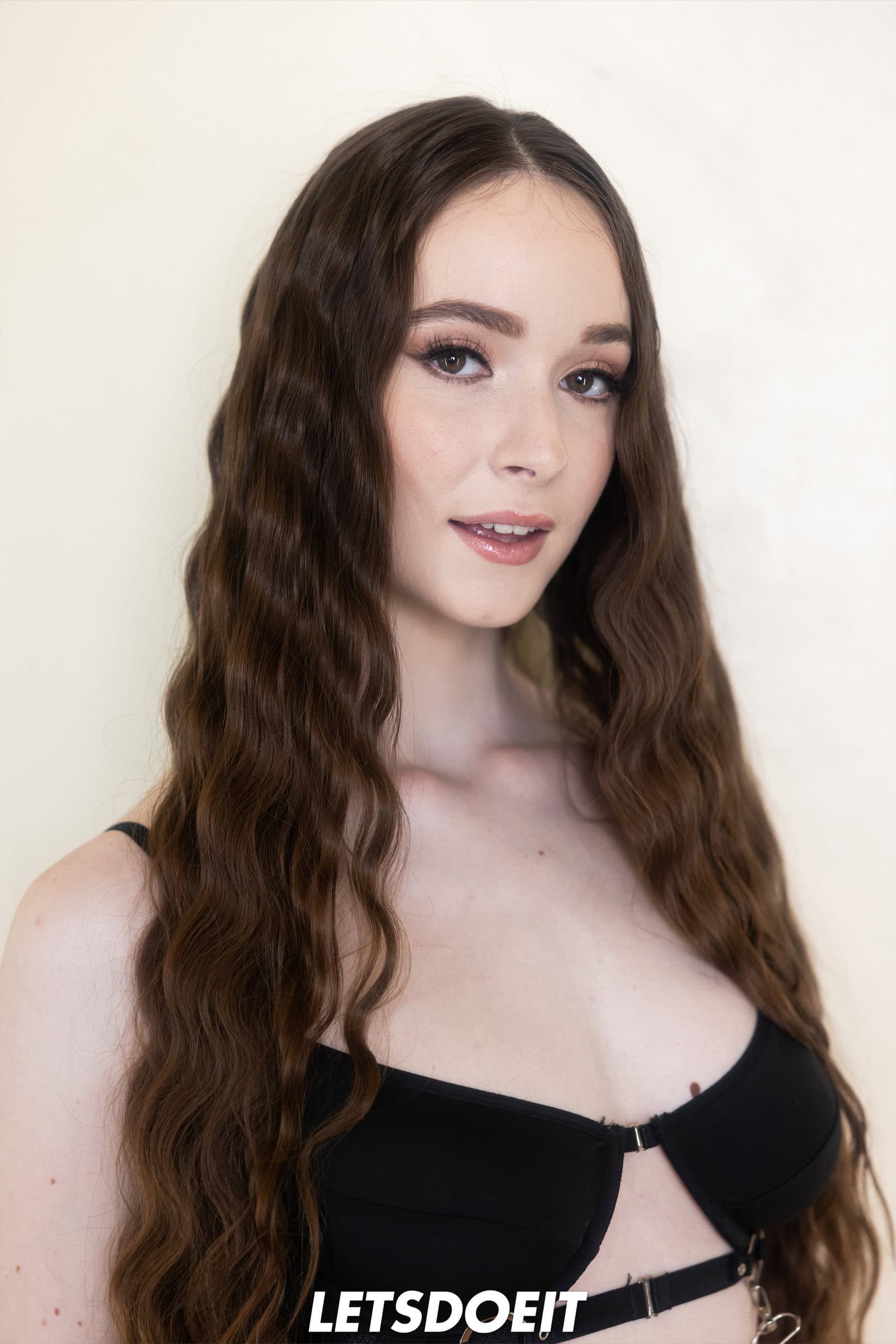 Hazel Moore takes off her black lingerie