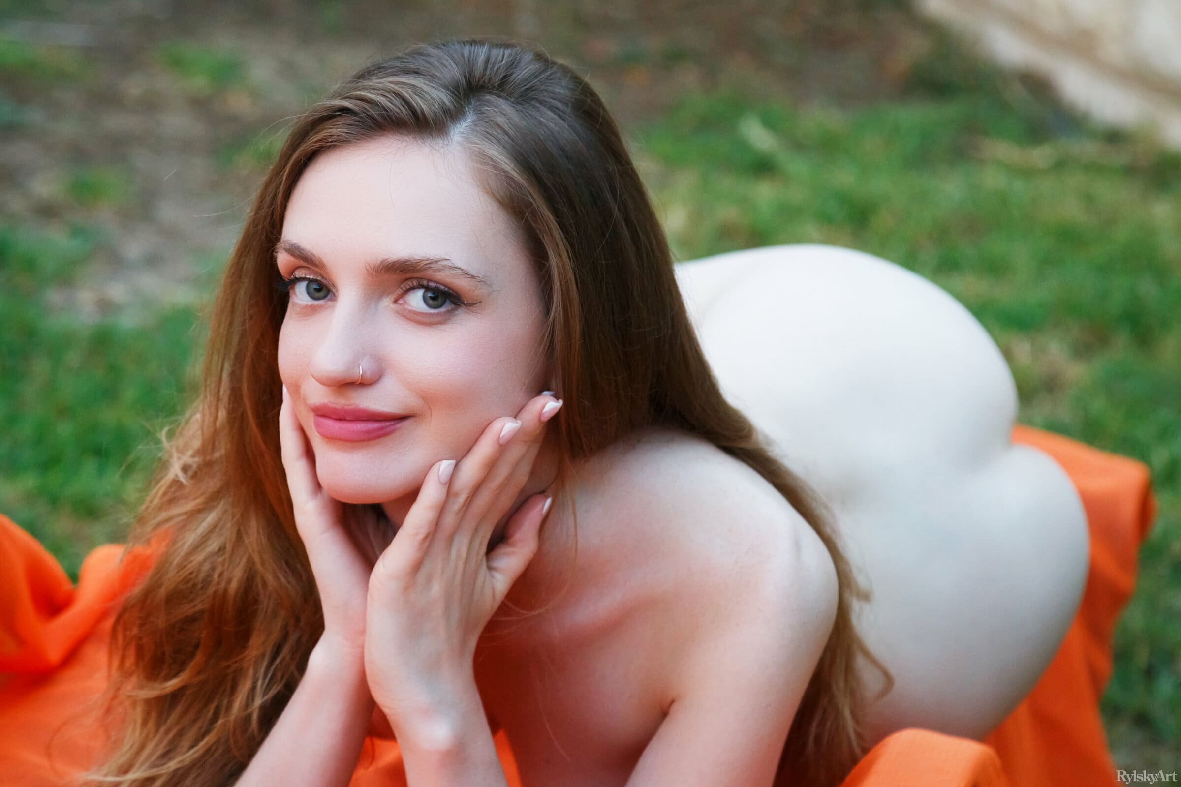 Cute Rocky Di showcasing her lovely body and spreading her ass cheeks outdoors