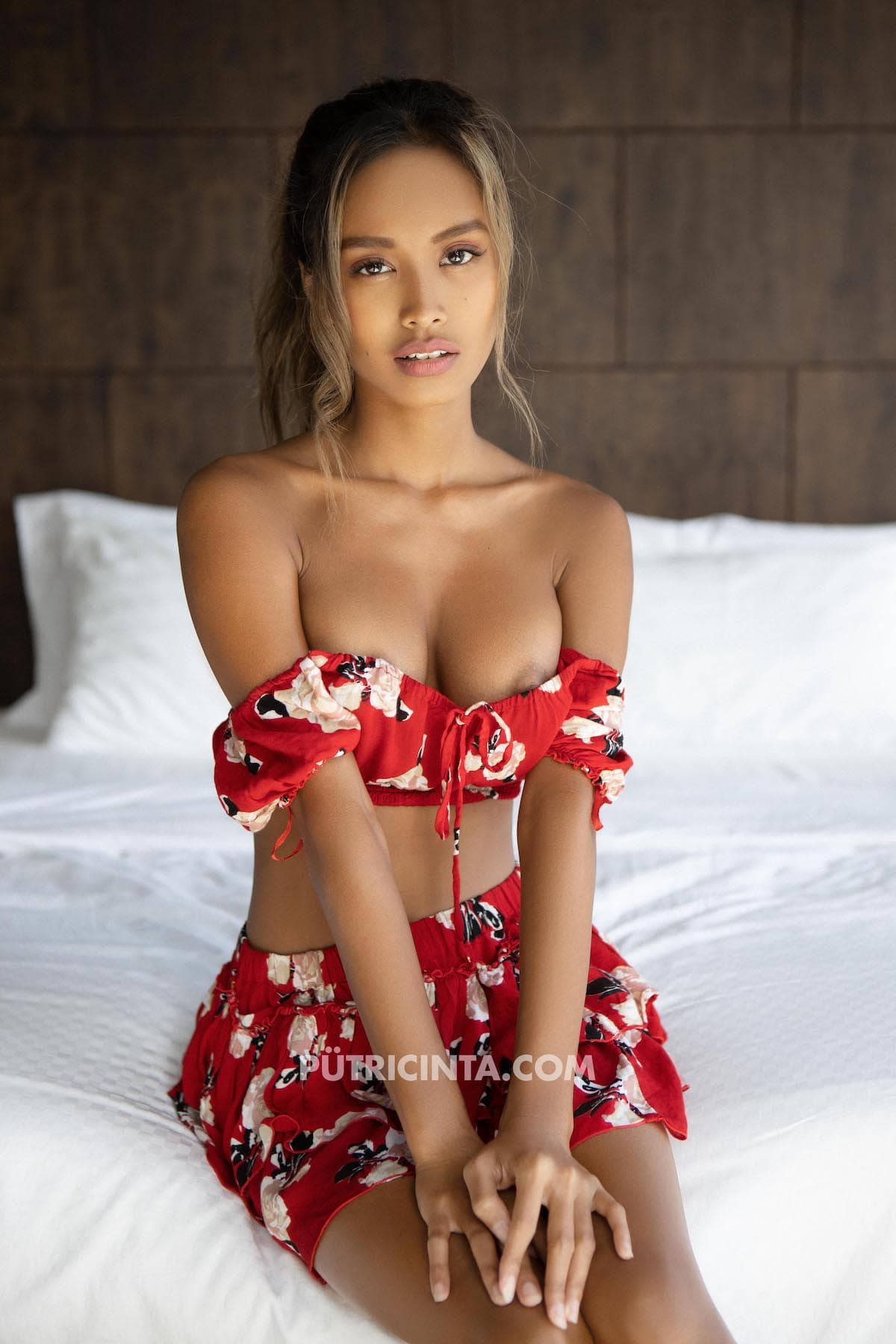 Putri Cinta gets undressed and starts reading her favourite novel