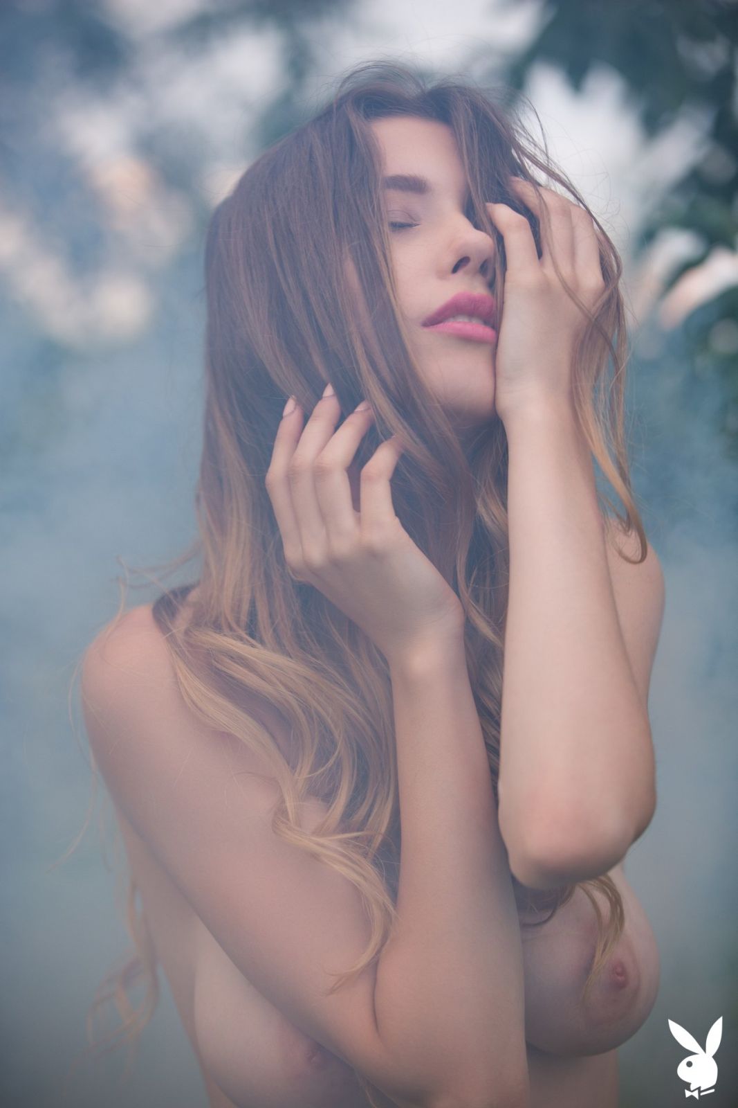 Mila Azul stripping nude outdoor while surrounded by smoke