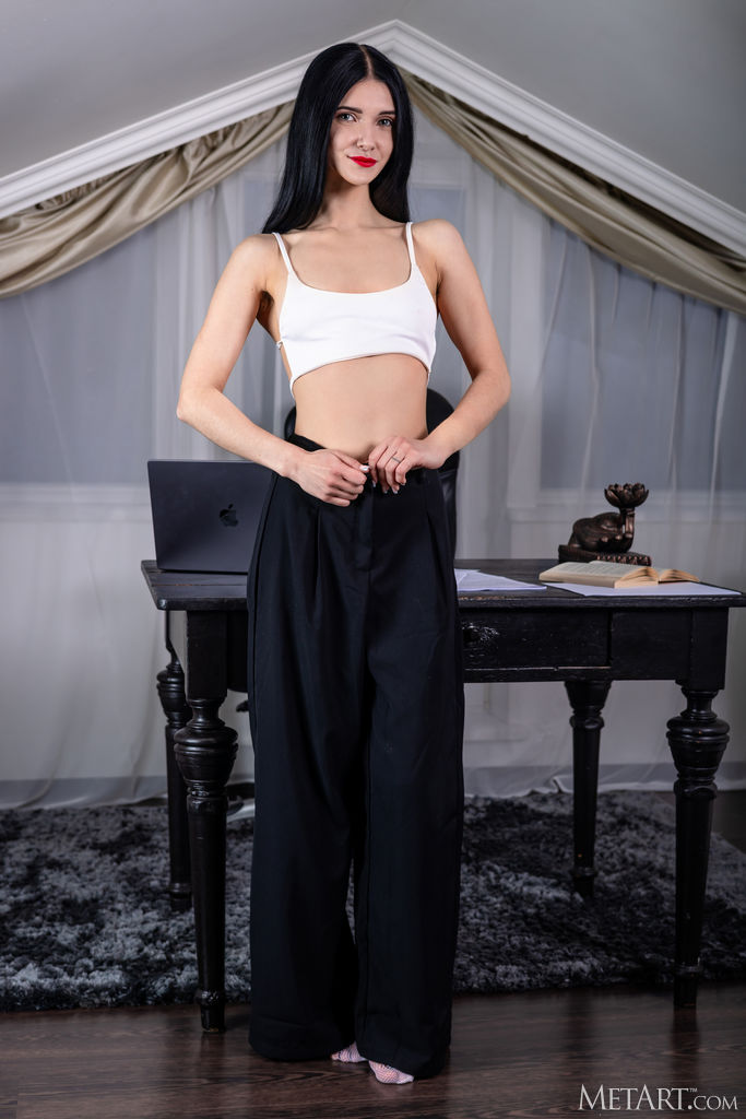 Posy Wearing Nothing But Her Garter Belt And White Stockings