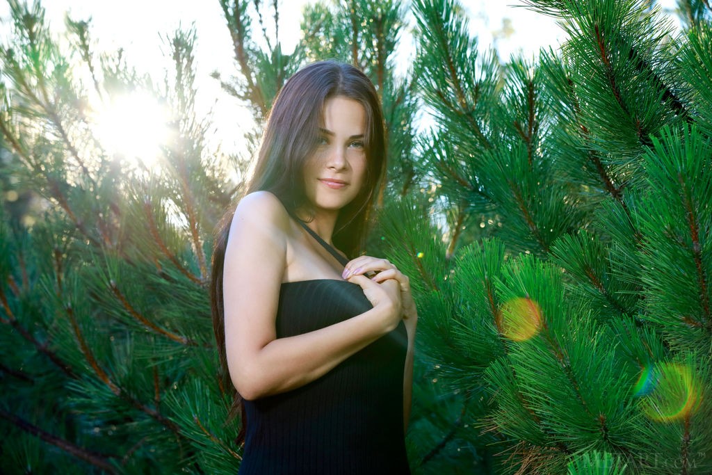 Martina Mink - Delightful teen brunette is hotly stripping in spruce bushes