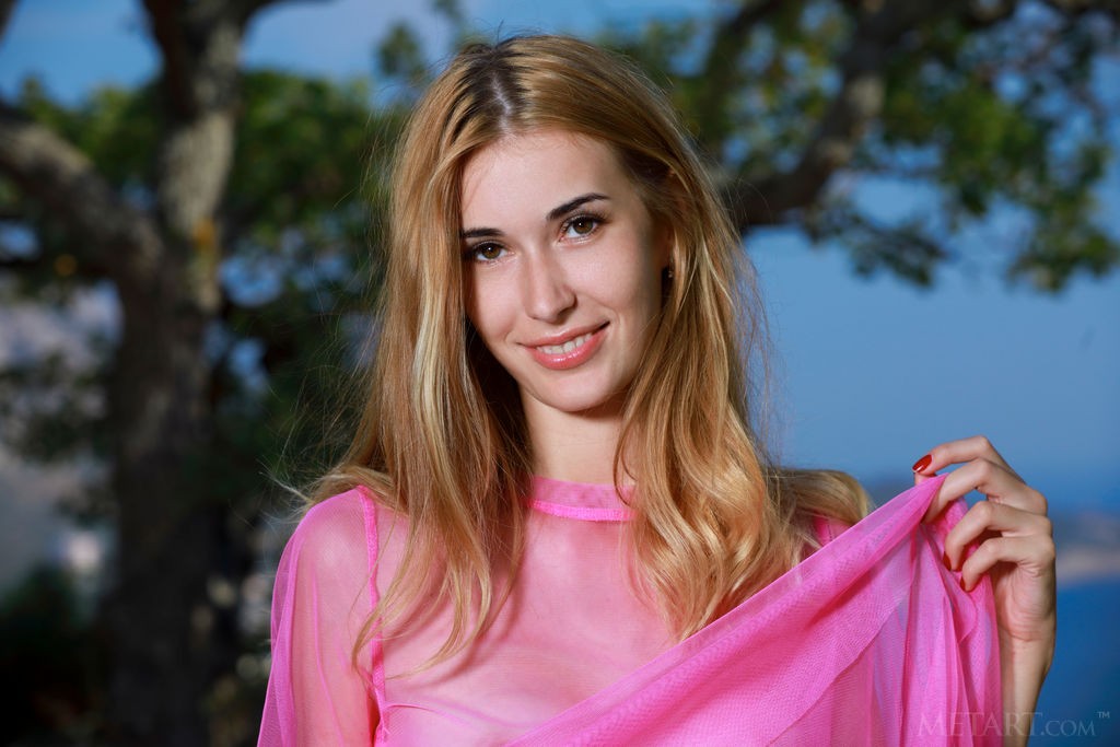 Aileen - Hottie undresses on a cliff to masturbate