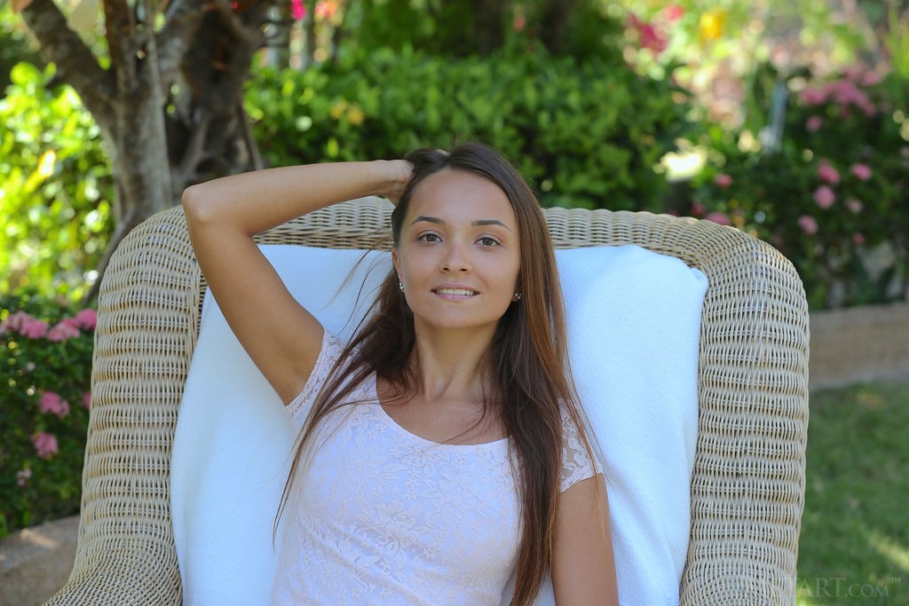 Veronika Benet - Working on her tan in the privacy of her garden