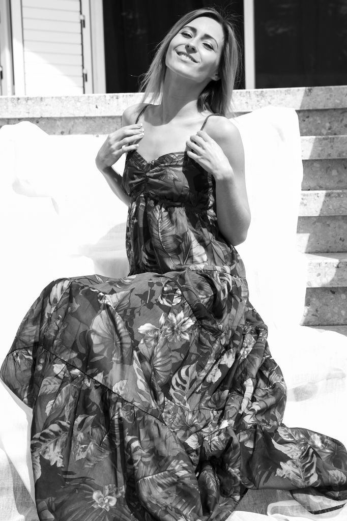Janelle B - Taking her dress off bit by bit in front of the house
