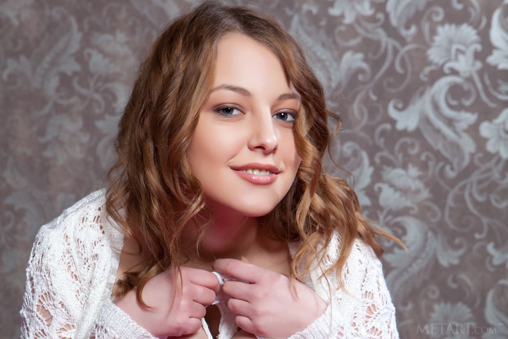 Nikia A - Barely legal teen babe enjoying a naked front page session
