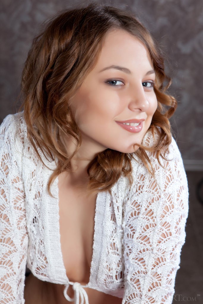 Nikia A - Barely legal teen babe enjoying a naked front page session