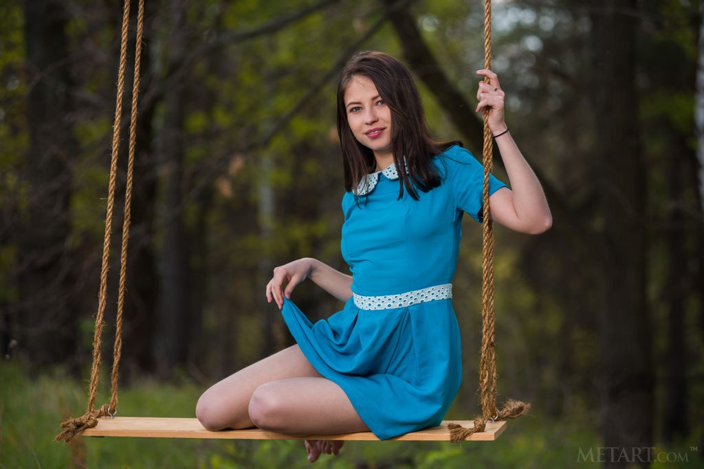 Hilary C - Swinging around in the woods naked is so much fun for her