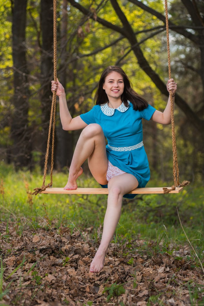 Hilary C - Swinging around in the woods naked is so much fun for her