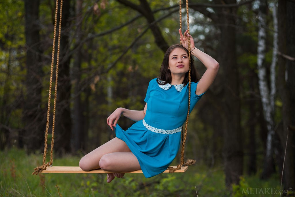 Hilary C - Swinging around in the woods naked is so much fun for her