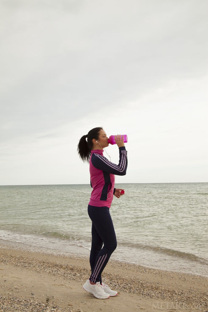 Eselda - Jogging along the sea and taking her clothes off by the way