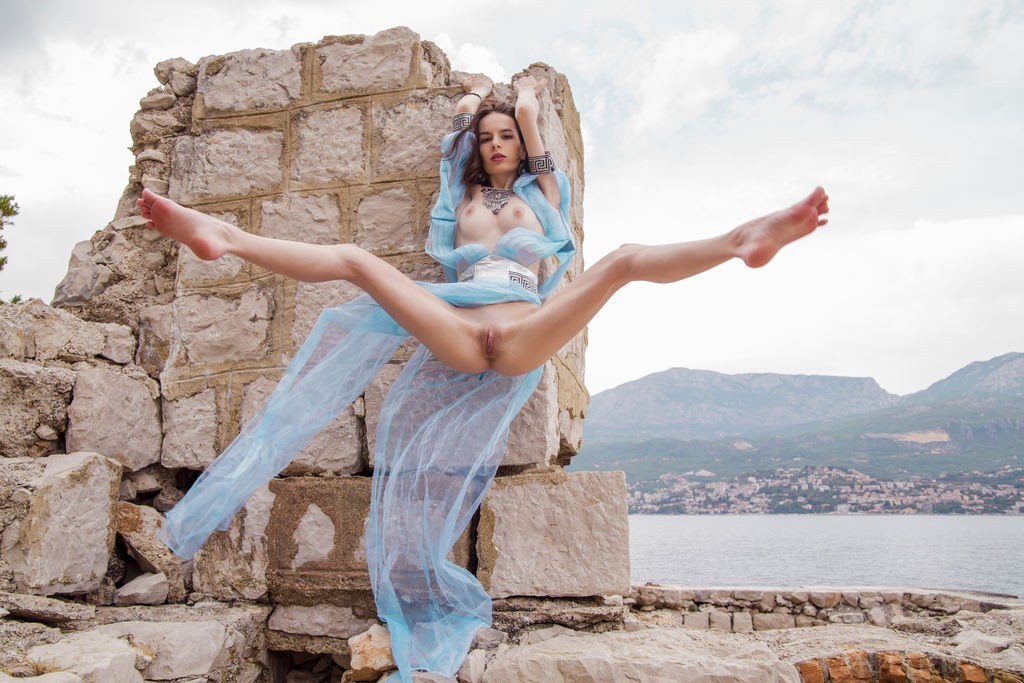 Debora A - Long-legged cutie spreads legs to show off pussy