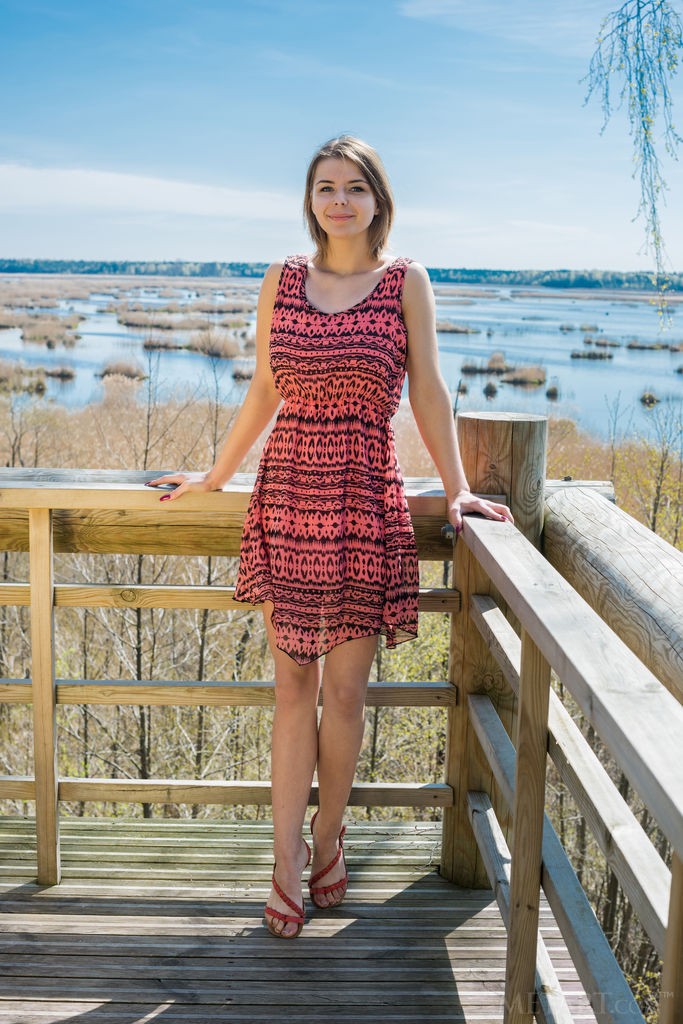 Yelena - During vacation she takes her dress off to get naked outside