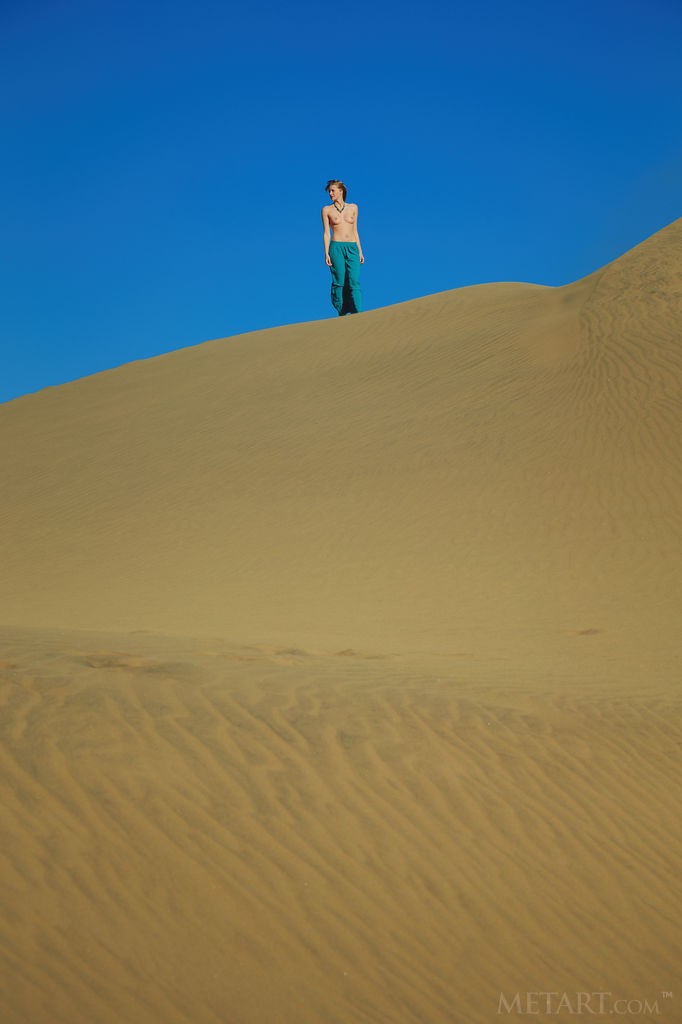 Mila I - Scorching hot redhead getting naked in the desert