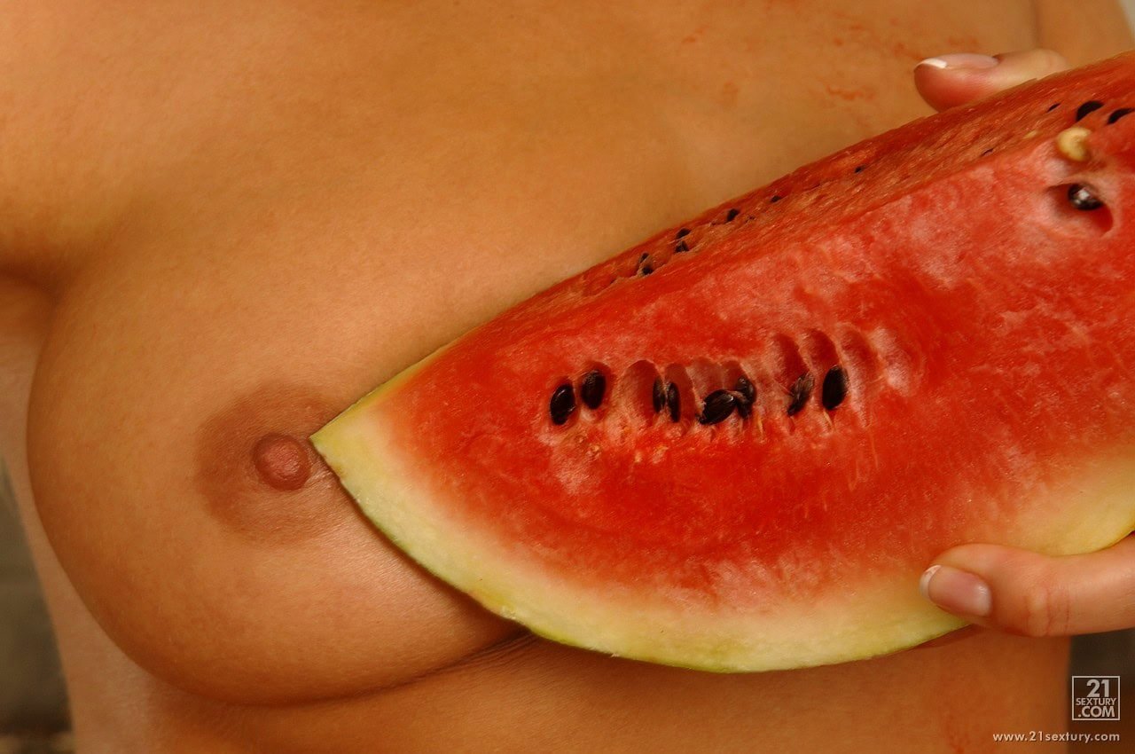 Adriana Malkova getting naked and enjoying some watermelon