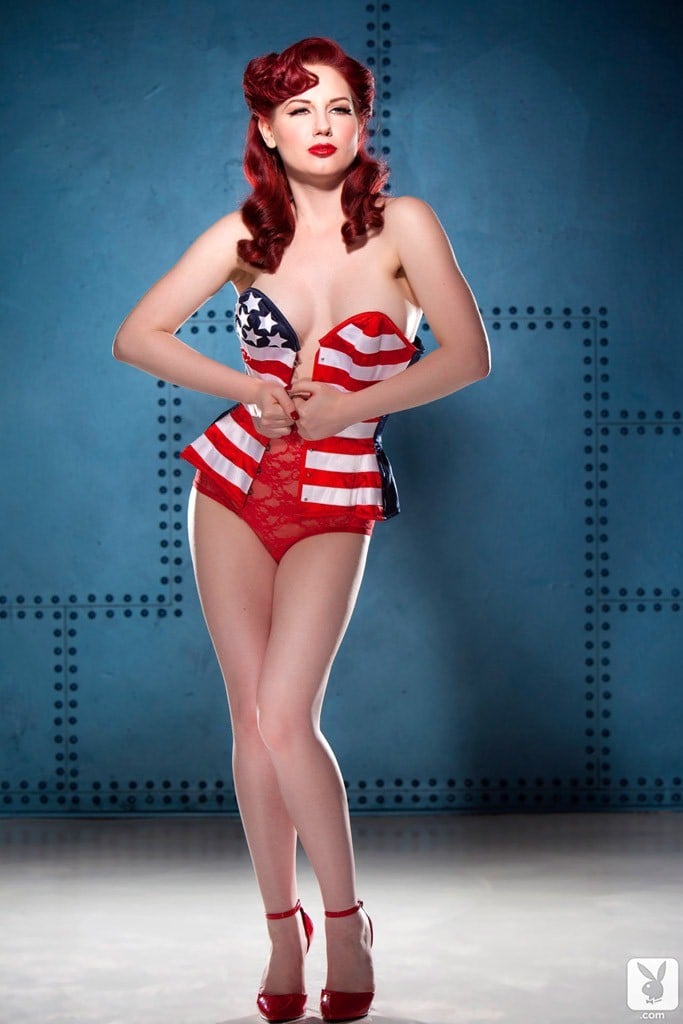 Beautiful redhead pinup girl Angela Ryan gets wild