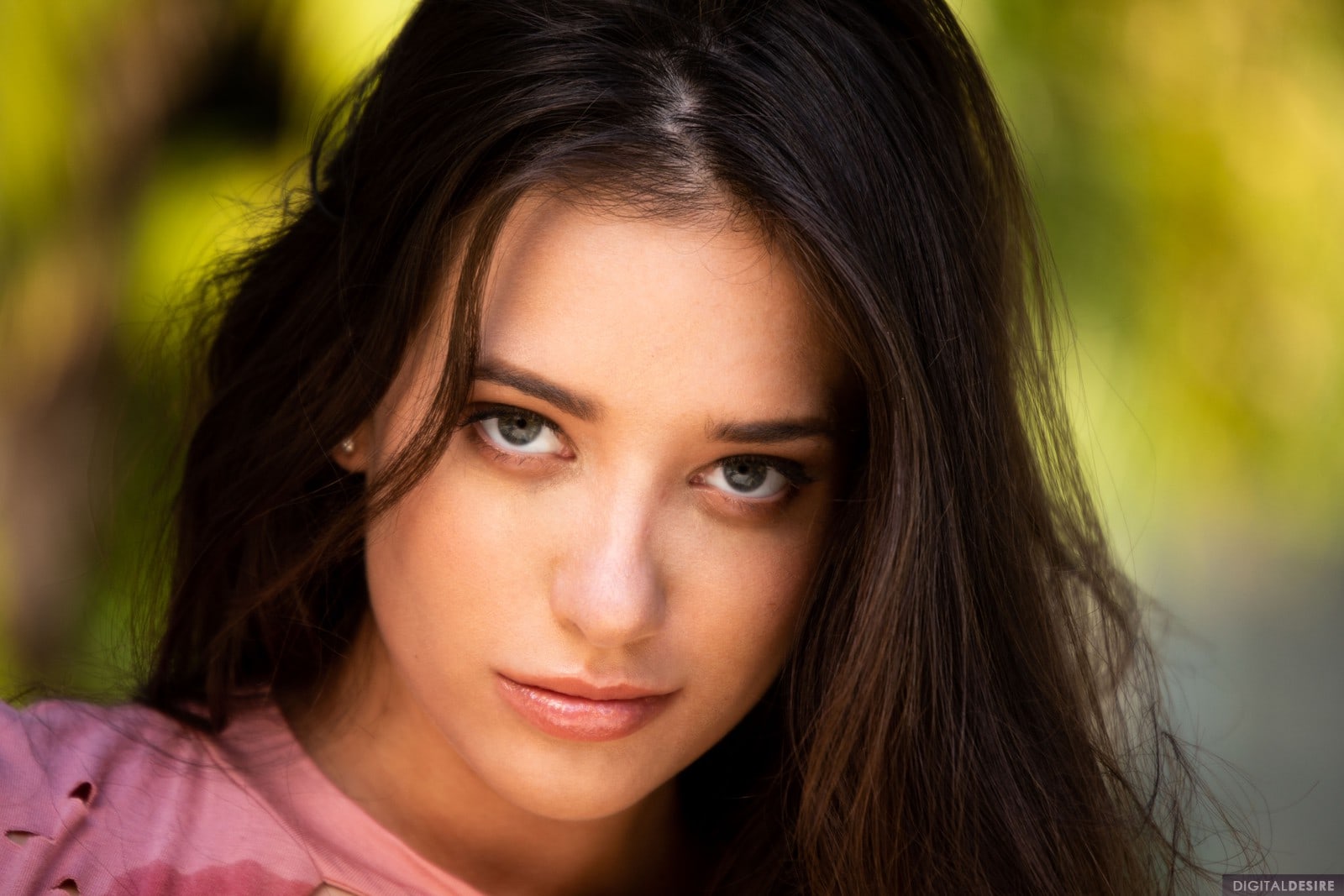Gia Paige is a young brunette pretty by the poolside